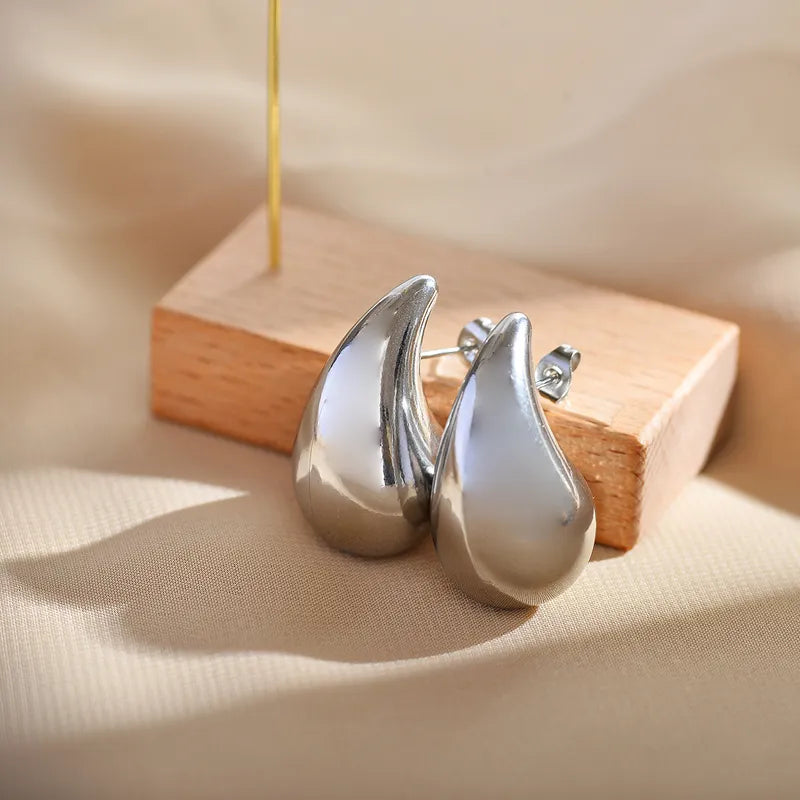 Aretes de gota gigantes plateados
